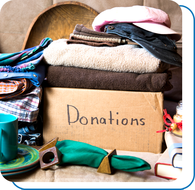 A box labelled "donations" filled with items for donation