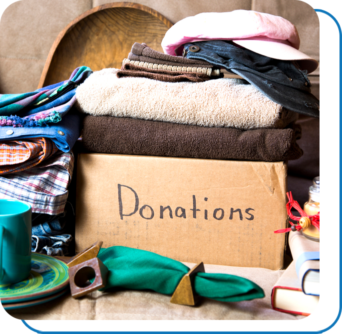 A box labelled "donations" filled with items for donation